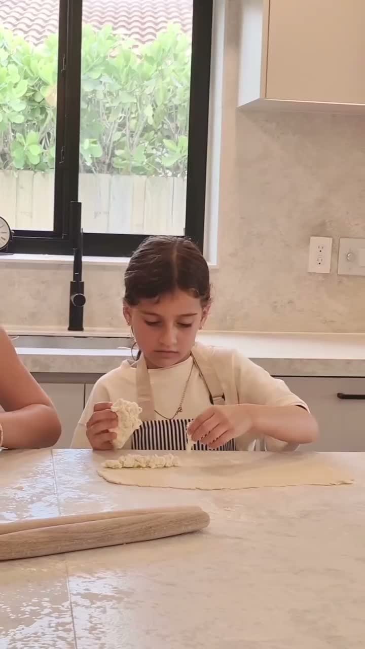 Child baking at the island